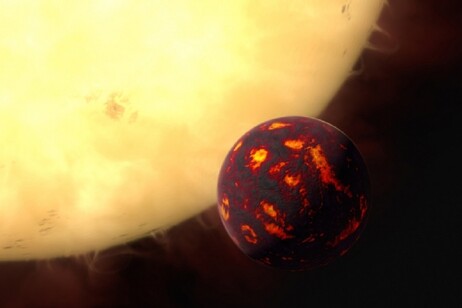 Rappresentazione artistica della superTerra 55 Cancri e vicino alla sua stella (fonte: ESA/Hubble, M. Kornmesser)